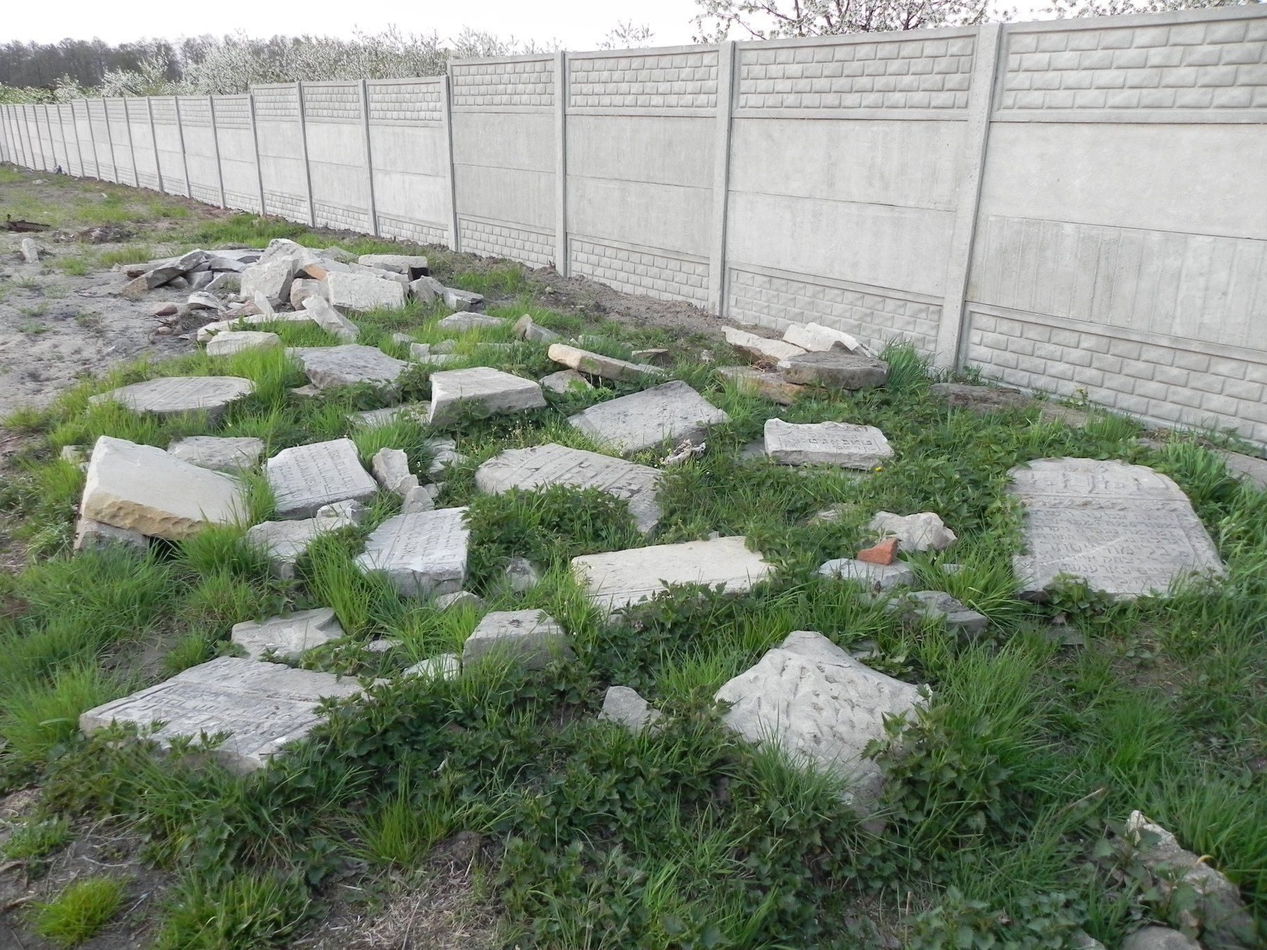 gravestones + wall