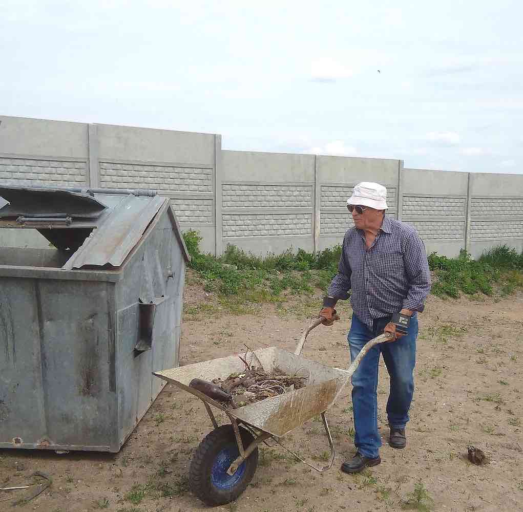 Piotr with wheelbarrow