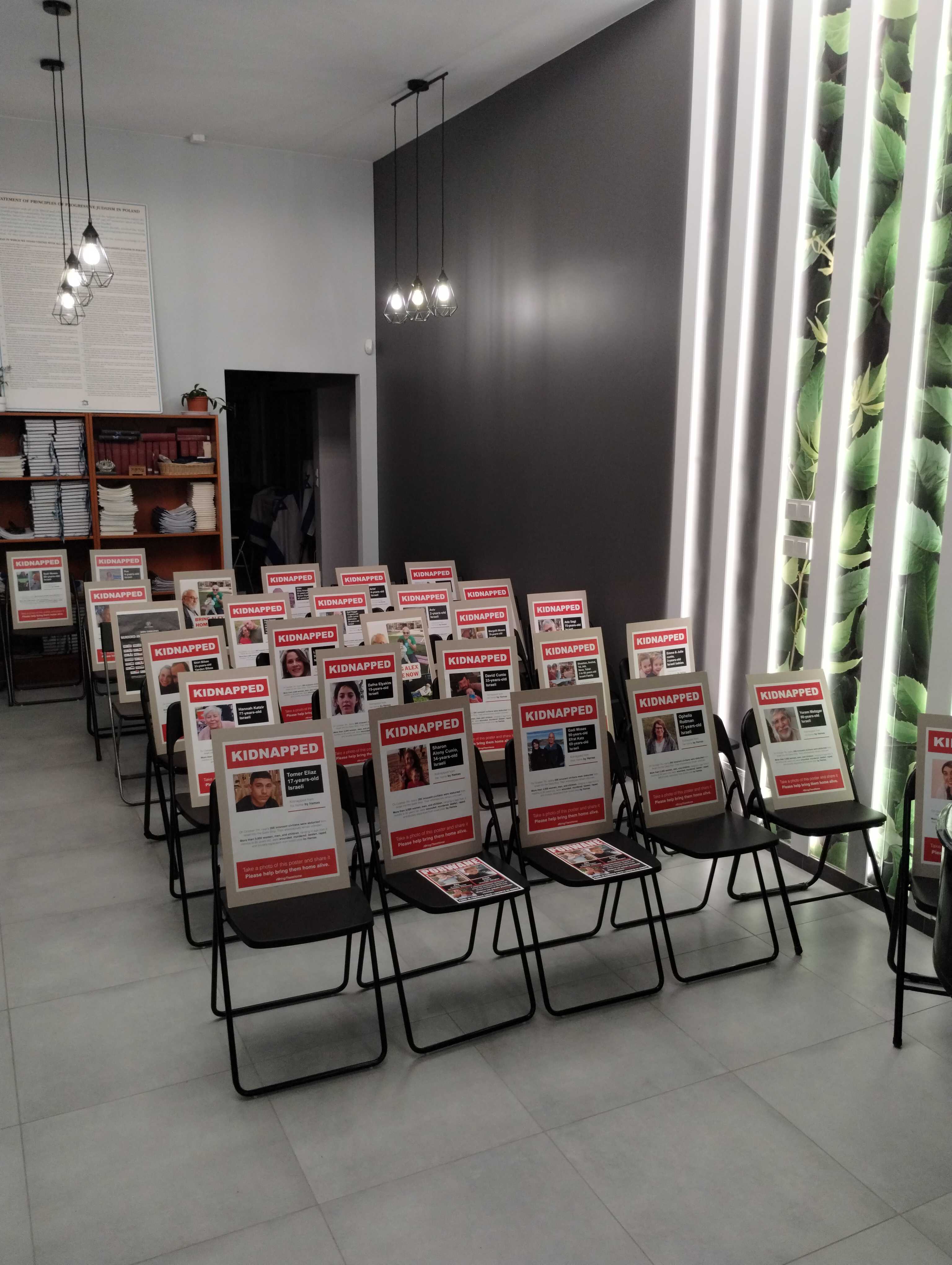 Beit Polska filled synagogue seats with posters for kidnapped Israeli individuals 5